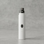 Cortauñas y lima eléctrica inalámbrica para perros y gatos de diseño ergonómico color blanco.